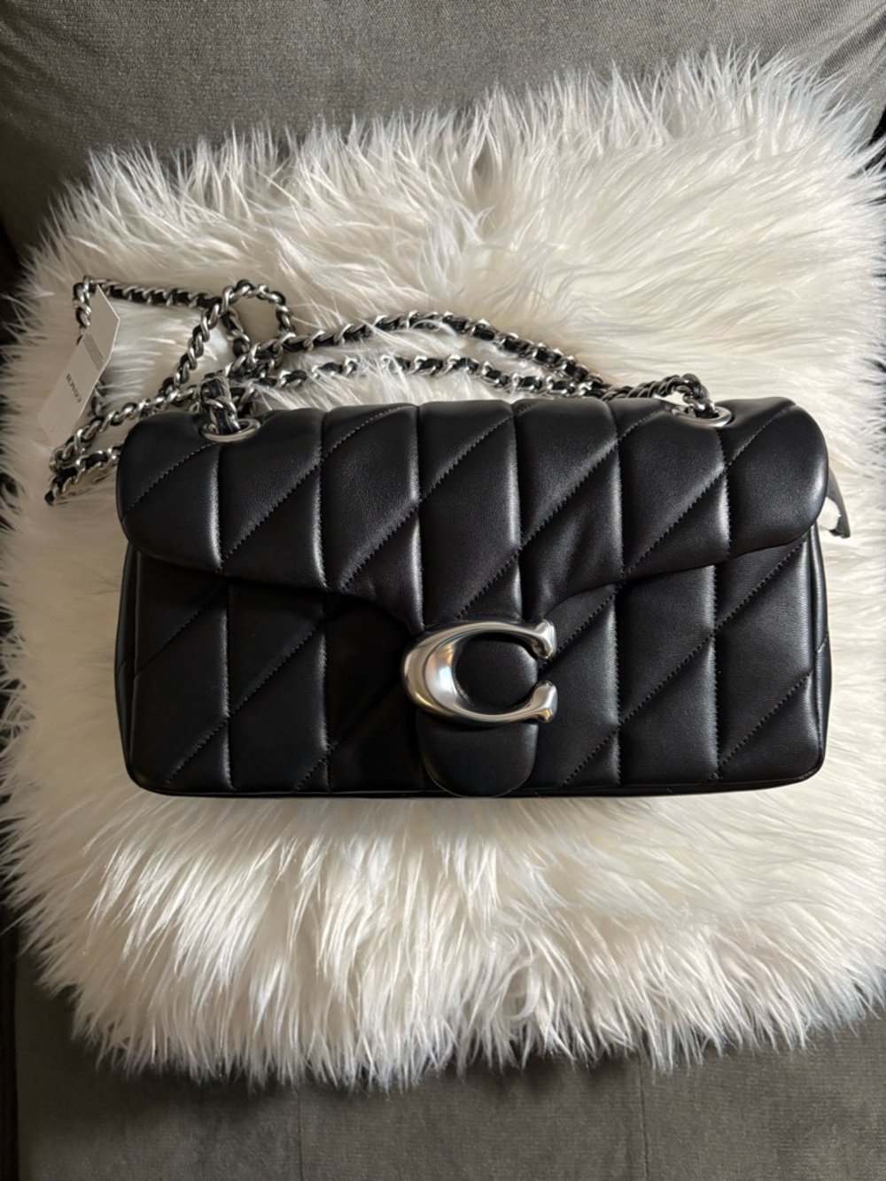 Coach Black Quilted Shoulder Bag with Silver 'C' Lock
Tabby 26
